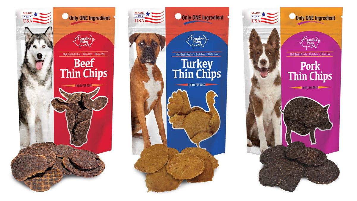Beef, Turkey, and Pork Thin Chips bags with loose chips in front, each bag labeled grain free