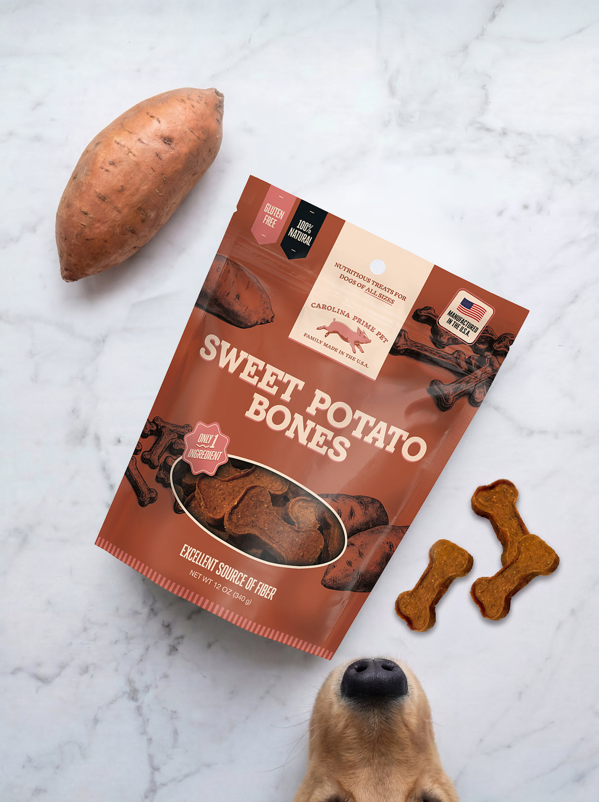 Carolina Prime Pet Sweet Potato Bones 12 oz flat lay with treats